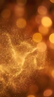 Shimmering golden particles flow across warm amber bokeh background, creating luxurious abstract effect suitable for premium branding, holiday campaigns, and festive design projects.
