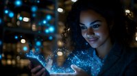 Young African American woman with curly hair holding smartphone with magical blue light and sparkles emerging from screen in dark ambient setting.