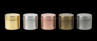 Metallic cylindrical storage containers with screw-on lids in gold, silver, rose gold, bronze, and gunmetal finishes. Isolated on transparent background, ready for design use on product mockups, packaging designs, and print-on-demand applications.