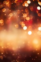Magical golden bokeh lights on dark background with blurred glowing circles and sparkles creating dreamy festive atmosphere for holiday designs.