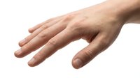 Human hand reaching forward on white background isolated for design projects and presentations.
