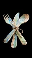 Rustic wooden cutlery set with fork, knife, and spoon tied with twine, isolated on transparent background. Great for stickers, t-shirt design, and print on demand.