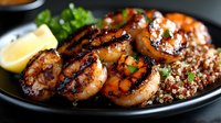 Grilled jumbo shrimp with caramelized glaze served on quinoa pilaf, garnished with fresh herbs and lemon wedge on black plate, close up food photography.