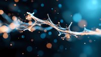 Frozen water droplets form delicate crystalline bridge against dark blue background with glowing bokeh lights, macro photography capturing winter magic and natural phenomenon.