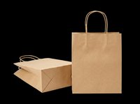 Kraft paper shopping bags with twisted handles isolated on transparent background, ready for retail packaging design, e-commerce mockups, store branding, print-on-demand products, and commercial packaging templates.