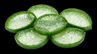 Sliced cucumber halves with fresh water droplets, isolated on transparent background. Ready for culinary design, recipe graphics, food packaging, print-on-demand products, and digital cooking content.