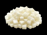 Pile of diced white onion cubes isolated on transparent background, ready for use in food clipart, stickers, print on demand, menu design, and culinary T-shirt projects.