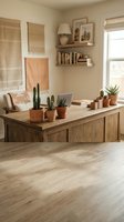 Cozy home office workspace with wooden desk, potted cacti and succulents, floating shelves with books, natural textiles and warm neutral decor elements.