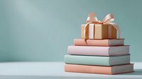 Stack of pastel colored books with golden gift box and pink bow on top against mint green background, creating minimal composition for special occasions.