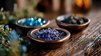 Colorful healing crystals and minerals in wooden bowls on rustic table with soft bokeh lights and green plants, spiritual wellness concept.