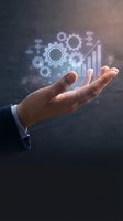 Businessman hand presenting holographic gears and growth chart symbols representing digital transformation and business automation solutions.