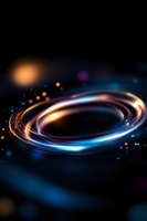 Glowing spiral light trails with orange and blue neon effects against dark background, creating dynamic motion and energy flow for technology concepts.