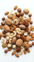 Mixed nuts collection with almonds, walnuts, cashews, hazelnuts and pecans isolated on white background for healthy snacking and cooking ingredients.