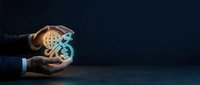 Business professional hands protecting glowing gear mechanisms symbolizing innovation, technology management and industrial process optimization.