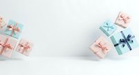 Assorted gift boxes with ribbons arranged on white background, isolated for holiday, birthday, and celebration design projects.