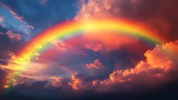 Vibrant rainbow arches across dramatic sunset sky with glowing orange and pink clouds, creating magical atmospheric scene against deep blue background.