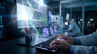Scientist analyzing DNA sequences on computer screen in modern laboratory. Genetic research and biotechnology concept for medical and scientific applications.