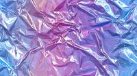Shimmering holographic foil texture with crumpled surface in vibrant blue and pink hues creating abstract reflective pattern for modern design backgrounds.