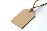 Blank kraft paper tag with natural twine string isolated on white background. Ideal for product labeling, gift wrapping, or retail price tags.