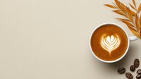 Aromatic latte art heart pattern in coffee cup with coffee beans and golden leaf decoration on beige background. Minimal coffee shop composition.