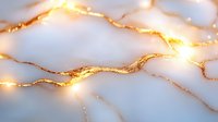 Elegant white marble texture with golden veins and warm LED string lights creating luxurious ambient lighting for holiday decor and festive celebrations.