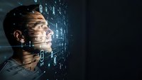 Young businessman with digital data projection on face representing artificial intelligence and machine learning technology in modern business environment.