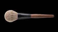 Makeup powder brush with wooden handle and soft bristles, isolated on transparent background. Ready for beauty, cosmetic, T-shirt, sticker, and print on demand designs.