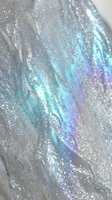 Holographic iridescent glitter texture with rainbow shimmer effects and sparkling particles creating magical cosmic surface for luxury design projects.
