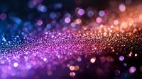 Magical glowing bokeh background with pink, purple and blue sparkles scattered on dark surface creating dreamy abstract light effect for festive designs.