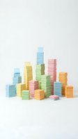 Colorful stacked sticky notes arranged in a cityscape formation on white background, representing organization, productivity, and business planning concepts.