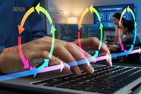Software developer typing on laptop with colorful DevOps lifecycle diagram overlay showing continuous integration workflow for agile development.