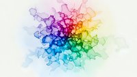 Abstract watercolor splash in rainbow colors with flowing organic shapes and vibrant gradients on white background for creative design projects.
