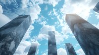 Dramatic upward view of modern glass skyscrapers against bright blue sky with white fluffy clouds, creating powerful perspective and architectural composition.