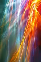 Abstract flowing lines in vibrant orange, teal and purple create dynamic movement against dark background, suitable for modern wall art and digital designs.