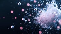 Dreamy cosmic background with pink and blue glowing particles floating in dark space, creating ethereal bokeh effect and magical atmosphere.