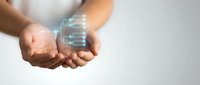 Hands holding glowing digital data folders representing cloud storage, file management and digital transformation technology solutions for business.