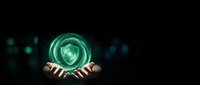 Hands holding glowing green shield symbol representing cybersecurity, data protection, and digital safety for technology and business concepts.