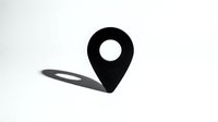Location pin symbol with shadow on white background, suitable for navigation apps, maps, travel websites, and GPS-related design projects.