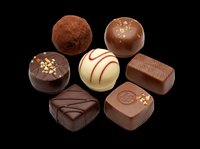 Assorted chocolate candies and truffles isolated on transparent background, ready for confectionery design, packaging, menus, and culinary graphics for print and digital projects.