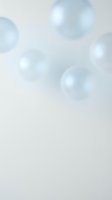 Soft blue bokeh lights floating on pale gray background creating dreamy atmosphere for presentations, websites, and creative projects.