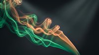 Abstract colorful smoke waves flowing on dark background with green and orange gradient effects for modern digital art and creative projects.