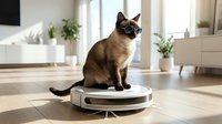 Siamese cat sitting on robotic vacuum cleaner in modern living room with natural light and houseplants for smart home automation and pet care.