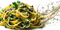 Delicious spaghetti pasta with creamy herb sauce and fresh parsley garnish, splashing water effect creating dynamic culinary composition.