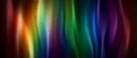 Vibrant rainbow spectrum with flowing colorful light waves creating dynamic abstract background for creative projects and digital art applications.
