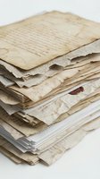 Stack of aged documents and vintage papers with handwritten text and yellowed pages, isolated on white background for archival, historical research, and heritage design projects.