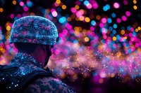 Silhouette of person in glittering cap against vibrant bokeh lights background with magical sparkle trail effect creating dreamy nighttime atmosphere.
