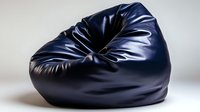 Navy blue leather bean bag chair with soft folds and creases on light background, modern furniture piece for contemporary interior design and home decor.