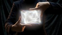 Hands holding glowing energy square with bright white light, mystical power concept for spirituality, magic, technology, and innovation themes.