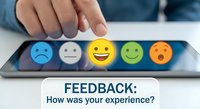Hand selecting happy emoji on tablet screen for customer satisfaction survey and feedback rating system in business service evaluation.