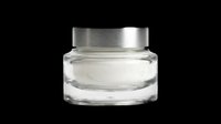 Glass jar with white face cream and silver lid, isolated on transparent background. Ready for cosmetic branding, stickers, print on demand, and T-shirt design use.